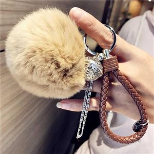 Fluffy Real Rabbit Fur Keychain Söt plysch Key Pendant Female Bell Palace Bell Bag Ornament smycken Trinka Accessories G101990750234K