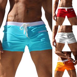 Mäns badkläder herrbadkläder män solida färg simning stammar dragkonstficka slim pass strand shorts badkläder 230616
