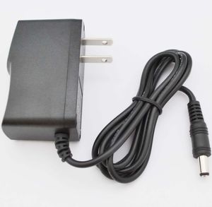 50pcs AC 100V-240V Dönüştürücü Adaptörü DC 5V 2A / 2000mA Güç Kaynağı ABD Fişi 5.5mm 2.1mm