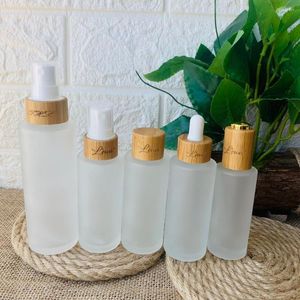 Bottiglie di stoccaggio Ricaricabili Pompa spray per lozione in vetro opaco trasparente da 4 once con coperchio in bambù di lusso Contenitore cosmetico con tappo in legno 5 1