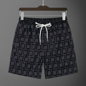 2023 FashionNew Pattern Summer Mens Shorts Sweepants 유명한 디자이너 짧은 바지 유니탄 편지 인쇄 남성 해변 여가 시계