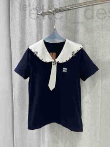 Bluzy damskie bluzy designerskie granatowy w stylu T-shirt wiosna/lato nowa koralikowana krążenie dekoracja satynowa satynowa fala octowa fala fala krawędź Polo szyja krótki rękaw