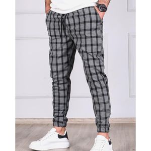 Pantaloni pantaloni reticolari da uomo di alta qualità pantaloni a matita sciolta casual pantaloni da uomo snello