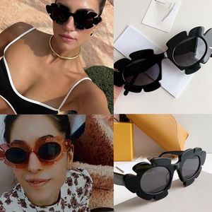 moda donna occhiali da sole in fiore in nylon infuso Giunto universale 100% protezione UVA / UVB da donna casual occhiali da sole personalizzati 40088