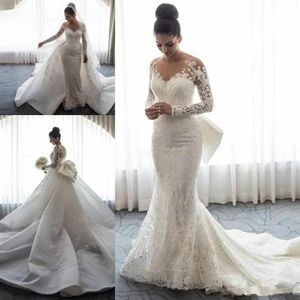 Steven Khalil 2018 Brautkleider im Meerjungfrau-Stil mit abnehmbarer Schleppe und großer Schleife, Spitze, Blumenmuster, lange Ärmel, Kirchenschleppe, Garten-Hochzeitskleider339T