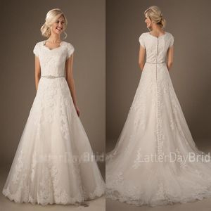 Long Country Modest Wedding Dresses Cap Sleeves Champagne Lining Beaded Lace Appliques Buttons Back Western Formal Bridal Gowns313J