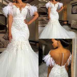 Luxury Mermaid Wedding Dresses Pärled Crystals Feather Sexy Illusion Covered Backs Back Sexig Deep V Neck Wedding Gown Vestido DE337W