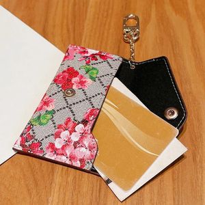 Designer Keychain Wallet Key Ring Keychain Pouch Luxury Key Chains Credit Card Holder Headset Lipstick Bag Coin Bag Pendant Fashion Envelope Charm Accessories