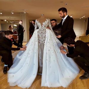 2022 Abiti da sposa africani lussuosi scintillanti con gonne Guaina in rilievo di pizzo Abiti da sposa Maniche lunghe Vedere attraverso l'abito da sposa225l