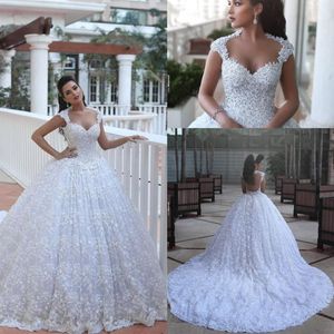 2019 Luxury Ball Gown Illusion Back Wedding Dresses Said Mahamaid Sweetheart Cap Sleeves Arabiska pärlspetsapplikationer Novia Bridal260e