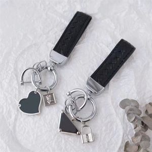 مصمم محفظة جلدية خاتم خاتم أسود ثلاثي المينا portachiavi عيد الحب يوم الأزياء سلسلة مفتاح سلسلة الزوجين PJ056 C23