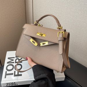 Populär modehandväska ny kvinnors väska västerländsk stil all-matchande crossbody väskor 21 cm