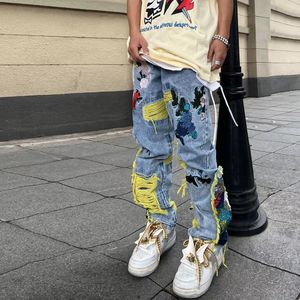 Мужские джинсы китайская живопись с вышитой джинсовой ткани, разорванной для вымытой уличной одежды для мужчин, разрушенных плиссированных джинсов мужской кисточки 230619