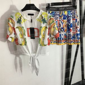 Literka T -koszule Tops Suits For Women Designer Vintage plisowane spódnice z krótkim rękawem z krawatem dziewczynki Zestawy ubrań