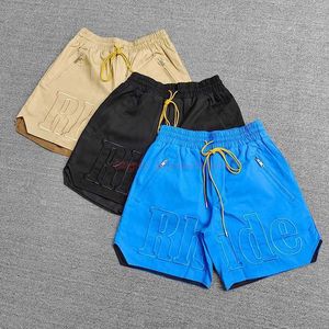 デザイナーショートファッションカジュアル服ビーチショーツ新しい高品質のrhudeアメリカン刺繍ドローストリングポケットトレンディなゆるいストリートパンツ男性ジョギング