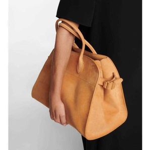 Designerskie torby skórzane Margaux Ręcznie zamsz w torbie dojeżdżające do podmiejskiej torba na torcie TOTE One luksusowe luksusowe torebkę wierszy 2023