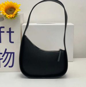 Raden Smooth Best Quality Leather Bag in Moon Half Women Designer med platt axelrem och krökt blixtlås Stängning Koppling Tote Suded Foder underarmsäckar Nisch Hig