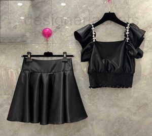 Two Piece Dress Designer Summer New Celebrity Style Fashion Heavy Industry Bubble Sleeve Studded Diamond Top with High Waist Short Skirt Set for Women 7I5B