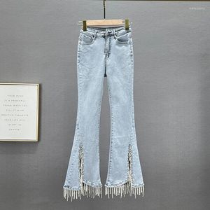Kvinnors jeans Tasseled Kvinnors 2023 Spring Summer High midjepärlor Rhinestones Flare Pants Blue Skinny Denim Trouser Female Jean