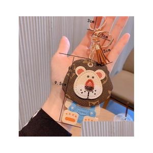 Keychains Lanyards Cute Lion Coin Purse Keychain Pendant Charm Jewelry Keyring Fashion Pu Leather Flower Grid Designer Metal Key C Dhrg3