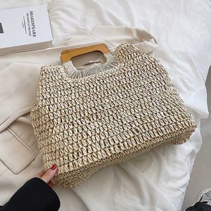 2022 new straw woven women's bag Japanese and Korean net red magazine wooden handle handbag large capacity Holiday Beach light 230621