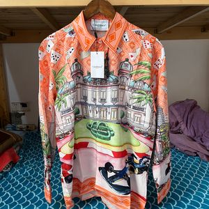 Magliette da uomo Holiday Style Casablanca Camicie Racing King Stampa maniche lunghe Outfit Loose 3XL Camicia hawaiana per uomo Donna 230620