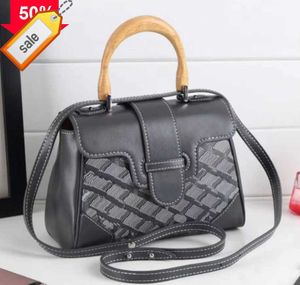 Varumärke Fashion Handbag Designer S Multifunktionella trähandtag Diagonal Cross Bag 2023 Nya tillverkare Lågpris Direktförsäljning