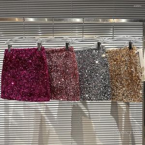 スカート女性のための短いスパンコールスカート2023春夏エレガントなソーシャルキャットウォークフルボディスパンコール光沢のあるヒップローズピンク