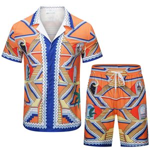 2023 crimine moda estiva tute da uomo Hawaii pantaloni da spiaggia set camicie firmate stampa camicia per il tempo libero uomo slim fit il consiglio di amministrazione manica corta spiagge corte