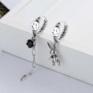 Yun Chaoxuan S925 Sterling Silver Street Style Sismmetric Rabbit Tasselパーソナライズされたトレンド女性ショッピング用の多目的な女性のイヤリング