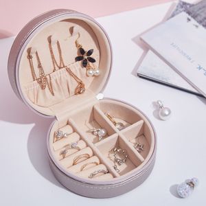 Ювелирные коробки из кожа кожа мини -круговой ювелирной коробки для женщин шампанские розовые серьги ожерелье для хранения шейки
