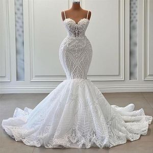 Abiti da sposa a sirena con perle sexy Appliques di pizzo Cinghie senza spalline Abito da sposa Abiti da sposa senza maniche di nuovo design su misura260z