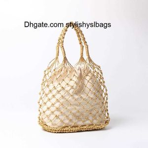 Evening Bags Gold silver 2 color bright paper ropes hollow woven handbag cotton lining straw bag female Reticulate handbag netted beach bag