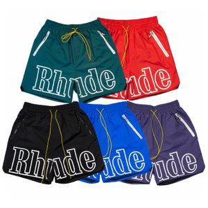 Homens shorts designer shorts rhude shorts tamanho S M L XL verão moda praia calças homens de alta qualidade street wear vermelho azul preto roxo calças leves mens curto US lpm