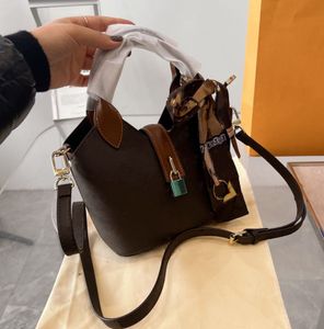 Het designer väska kvinnor handväska klassiska lyxiga shoppingväskor riktiga läder axel väska affärspaket satchel handväska väskor axelväskor 18*15 cm toty tory väska 2023