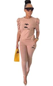 2023 new Tracksuits Sexy Hollow Out See Through 2 Piece Pant Matching Set Women Shirt Tops Leggings Skinny Outfit for Woman
