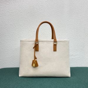 New women's handbag canvas shopping bag, high-end luxury, versatile, versatile for short distance travel, practical, free and easy fashion charm