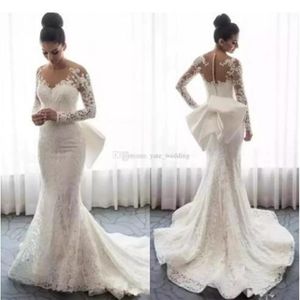 2019 Abiti da sposa a sirena in pizzo Collo trasparente Maniche lunghe Appliques Fiocco Abiti da sposa arabi sauditi con bottoni staccabili Br217e