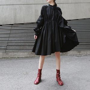 أزياء القمصان غير المتكافئة القمصان النسائية السوداء السوداء الطويلة 2021 الخريف نفخة الأكمام قميص فستان الإناث بلساس زائد