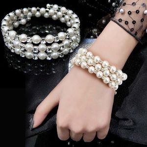 Dekorativa blommor armband och hand smycken mode flerskikts pärla inlagd diamantlindande spiral för kvinnlig koreansk brud bred version