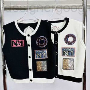 Kadın Sweaters Designer 2023 Moda Nakış Tek Kelime Kelime Sequin Sequin Örgü Hırgalar Kadın O boyun kolsuz tasarım üstleri M0I2