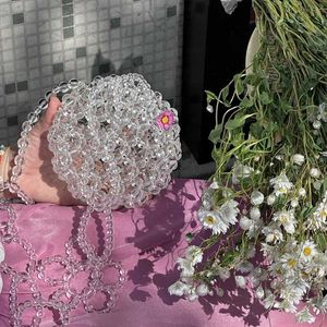 Nya kvinnors avancerade mini-runda kristallpärlade väska med blommakulstrap ins söta japanska och koreanska kvinnors handgjorda crossbody väska 230625