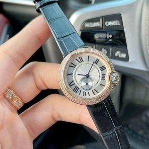 Diamond Inlay Watch Quartz Automatiska herrklockor Bezel rostfritt stål Kvinnor Diamond Wristwatches