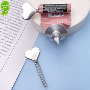 New Metal Manual Dentifricio Spremiagrumi Dispenser in acciaio inossidabile Tubo Spremiagrumi Tubo per crema per le mani Set di rulli chiave Accessori per il bagno