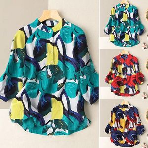 Kvinnors blusar Kvinnor vår och sommar runda hals skjorta knapp tryck bomullslinne texturklänning juniorer västerländsk tunika design