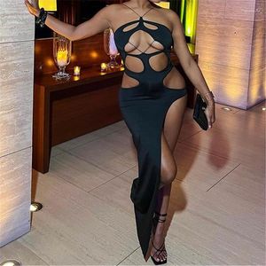 Casual Dresses Y2K SexyClub Hollow Out Black Bandage Maxi Dress Spaghetti Strap Asymmetrical Split Backless Slim for Women 2023 Summer