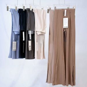 Pantaloni da yoga svasati da donna a vita alta Leggings da allenamento fitness Pantaloni lunghi elasticizzati per il controllo della pancia Pantaloni a gamba larga da palestra