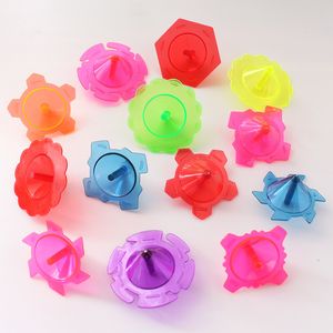 Spinning Top 10st Colored Mini Rotate Plastic Classic Toys Children Adult Relief Stress Desktop Games Barn roliga födelsedagspresenter 230626