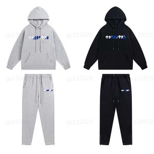 Trapstar Track Tute Designer Maglione Pantaloni Set Uomo Autunno Set due pezzi Bianco Blu Lettere Asciugamano Ricamo Imbottito Felpa con cappuccio Felpa Pantaloni Uomo Designer Abbigliamento