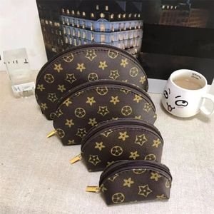 Högkvalitativ 4st Set Designer New Women Cosmetic Bags Organizer Famous Makeup Bag Travel Pouch Make Up Ladies Cluch Purses Organizador toalettartikar